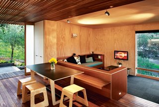 Students Pass Their Class by Building a House in New Zealand - Photo 5 of 7 - Designer Tim Webber created the dining table and stools.