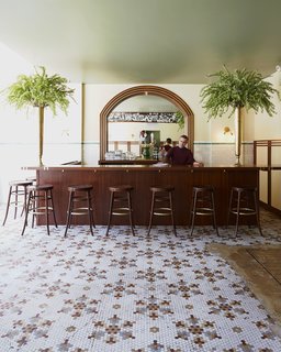 This Boutique Hotel Loves its City Like No Other - Photo 6 of 14 - Faust, the hotel's restaurant, hearkens back to 19th-century Bavarian beer hall. The bar, stools, and furniture in the space are by Jessica Carnevale, a RISD-trained designer who's based in Brooklyn. 