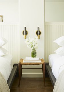 This Boutique Hotel Loves its City Like No Other - Photo 10 of 14 - Vermont manufacturer Conant Lighting produced the wall sconces, which are ASH's design, next to each bed.
