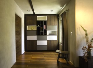 No Walls Were Knocked Down in the Making of This SF Pad - Photo 3 of 7 - The apartment is filled with storage, including this custom unit in the master bedroom by Tom Clossey.