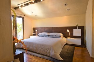 No Walls Were Knocked Down in the Making of This SF Pad - Photo 4 of 7 - The platform, headboard, lacquer nightstands, and shelves in the bedroom are all custom designed by LOCZI and built by Tom Clossey.