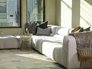No Walls Were Knocked Down in the Making of This SF Pad - Photo 6 of 7 - A modular Tufty-Too sofa by Patricia Urquiola for B&B Italia fills a corner of the lounge area. It's paired with side tables by Warren Platner.