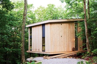 Those costs were partially recouped by using knotted pine planks for the exterior. 