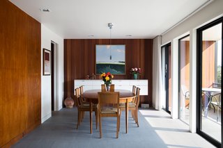 Mahogany paneling, original to the house, was reused as much as possible.
