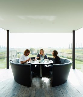 Wynants lives in the house with his wife, Hilde Louwagie, and their three children. His own circular seating design, Kosmos, is in the kitchen.