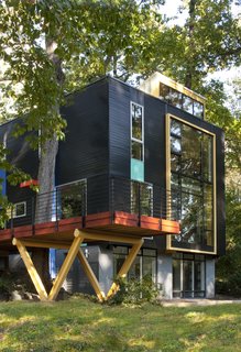This Multicolor Facelift Owes Much to Modern Art - Photo 1 of 4 - A facade of contrasting colors and textures announces the expansion of this home in Takoma Park, Maryland. Resident and builder Alan Kanner called on longtime collaborator, architect Mark McInturff, to help him add a second story and 900 square feet to the residence. 