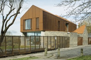 Bold House Doubles as a British Town's Welcome Sign - Photo 6 of 6 - Along the road, the exterior walls are covered with ash-glazed Sussex brickwork, which "gives a softer texture and more intimate scale to the street," Rendel says. 