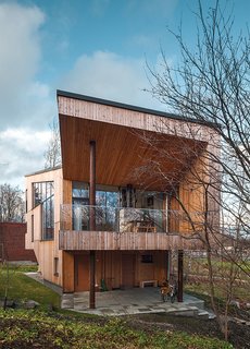 This Home Will Make You Want to Build Your Own Sauna - Photo 10 of 10 - The exterior is clad in Siberian larch, which doesn’t require paint and will develop a gray patina.