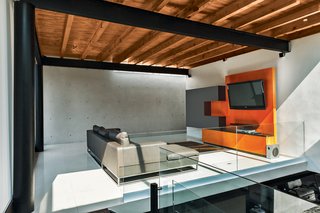 Roche Bobois’s Agami sofa anchors the media room. 