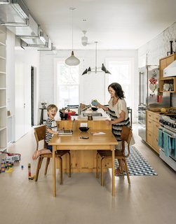 Kitchen & Dining Room "This room really became the heart of the space," Dawn Casale says. "If people are sitting at the dining table or in the living area, you’re able to have a really free-flowing conversation and there’s a nice dynamic happening on the entire floor."
