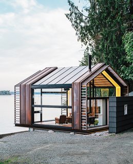 A Former Garage Hosts the Best Parties - Photo 7 of 9 - Standing-seam copper siding accentuates sections of the structure that provide shear support for the steel moment frame.