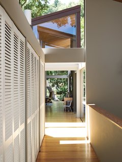 You Don't Have to Just Be at Your Desk When Working from Home - Photo 6 of 19 - The bridge leads from the living room to the bedrooms and from the studio to the garage. 