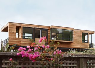 Rising Tides Are No Match for This Coastal Home - Photo 3 of 10 - The eastern side offers an equally mesmerizing view of Mount Tamalpais, which is lush with foliage throughout the year. 