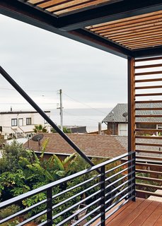 Rising Tides Are No Match for This Coastal Home - Photo 4 of 10 - With almost as much area dedicated to decks as to interiors, Peter Dwares’s house is truly made for outdoor enjoyment. 