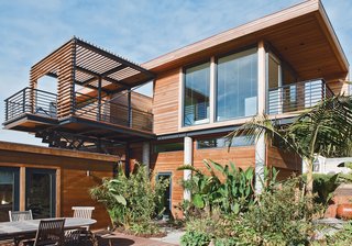Rising Tides Are No Match for This Coastal Home - Photo 9 of 10 - The cantilevered entry court assists with the reinforcement by securing the building’s weight seaward. 
