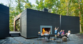 16 Inviting Countryside Cabins - Photo 6 of 16 - Katie and Danny MacNelly met as University of Virginia architecture students and started their own practice, ARCHITECTUREFIRM, along with another former UVA classmate. Together, the couple designed and built their family’s country retreat, a three-volume residence near Virginia’s James River.