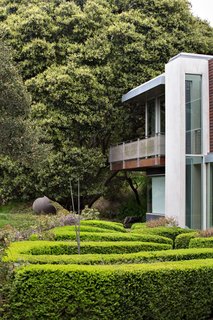 A zigzag hedge garden is meant to "feel a bit like a garden in England," says Gina Peterson. 