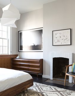 725 Square Feet and Loads of Modern Gems - Photo 6 of 6 - The chair, by Danish designer Arne Hovmand-Olsen, was purchased through Wright. The dresser was sourced from Chairish.