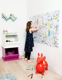 Guest rooms provide space for visiting grandchildren. Tiffany’s daughter, Anouk, uses a bedroom wall to hold a work in progress.