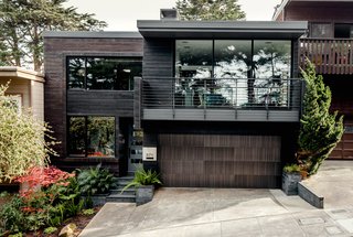 Scott MacFiggen and Regina Bustamante, tech industry veterans from Silicon Valley, called on architect Christi Azevedo to rebrand a fusty house in San Francisco’s Noe Valley, starting with the street view. Cedar boards, charred using the Japanese technique shou sugi ban, replaced plywood siding.