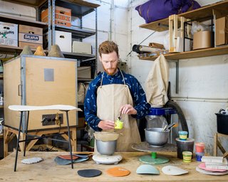 The designer working in his studio. 