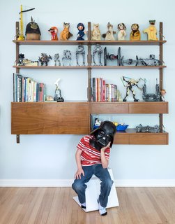 American Beauty - Photo 5 of 8 - Lawrence, seven, shows off his toy collection on a vintage Cado wall unit in his bedroom. 