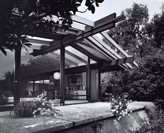 The architects maintained the midcentury post-and-beam construction and Japanese-inspired details of the original building, while brightening and expanding the interior living spaces.
