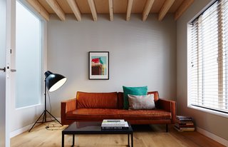 New Kid on the Block - Photo 8 of 10 - The Bank Slimm sofa by local furniture purveyor Loods 5 is paired with pieces sourced from British retailers Made and Habitat in the second-floor living room. 