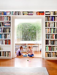 Check Back - Photo 5 of 14 - Toys are stashed in the play area. The couple customized the IKEA Ivar shelving system ("It’s like adult-sized Legos," Snyder jokes). 