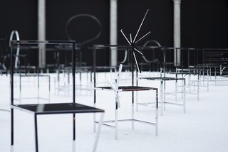 The chairs are completed with a mirrored finish. 