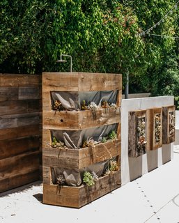The outdoor shower, which he designed in collaboration with landscape contractors Warren-Avard, is surrounded by reclaimed hemlock planters.