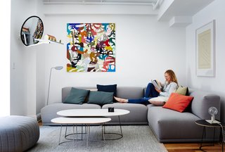 The New York loft of Muuto cofounder Peter Bonnén showcases a shipping container’s worth of furniture from Denmark. His wife, Jasmi, relaxes among Muuto designs, including a Connect sofa by Anderssen & Voll and Airy tables by Cecilie Manz. The wall sculpture is by artist Anders Kappel; the painting is by Peter’s brother, Kaspar.
