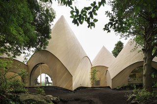 How to Age Gracefully in Japan - Photo 1 of 6 - Designed for two women in their 60s, this collection of little huts is both a private home and offers a food service to the community. 
