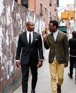 Designer Ini Archibong Finds A Patron in Actor Terry Crews - Photo 1 of 4 - Actor Terry Crews, left, and designer Ini Archibong have a longstanding friendship based on shared ideals. In April 2016 they worked together to debut In The Secret Garden, a collection of furnishings conceived by Archibong, at the Milan furniture fair, a respected launching ground for burgeoning design industry players. 