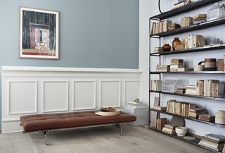 10 Things You Didn't Know About Poul Kjærholm - Photo 7 of 10 - Kjærholm was influenced by the Barcelona Pavilion and the complementary furniture by Mies van der Rohe. Again, the matte-steel frame with its exposed joints is on full display at the company's flagship showroom in Copenhagen. As a continuation of his material vocabulary, the base is connected by rubber fasteners and screws. 