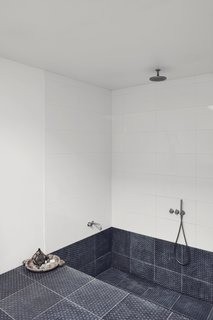 A Recent Trip Leaves Us Dwelling on Denmark - Photo 9 of 14 - The recessed bath and shower makes the space feel like a private spa. 
