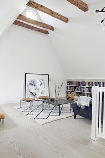 A Recent Trip Leaves Us Dwelling on Denmark - Photo 10 of 14 - The children's bedrooms and living room are on the second floor. Two PK31 stools sit around a PK61 coffee table. 