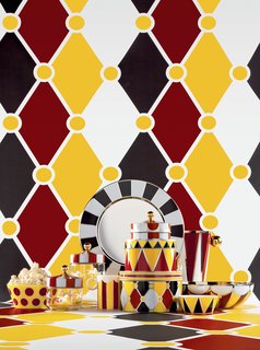 The core pieces are made from stainless steal and finished with geometric patterns. Combinations of red, yellow, black, red, gold, white, and silver alternate on the objects across the collection. 