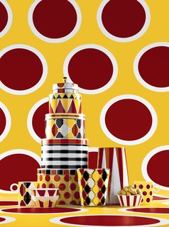 While the majority of pieces are steel, the dishware, trays, and containers are all made from bone china. 