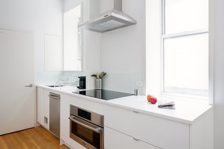 This 390-Square-Foot Renovation Is Compact Yet Comfortable in Greenwich Village - Photo 5 of 9 - The space-saving appliances are all from Bosch’s 500 and 800 series.