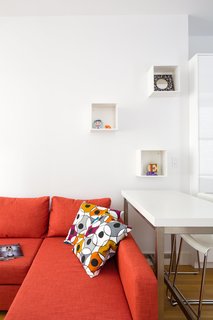 This 390-Square-Foot Renovation Is Compact Yet Comfortable in Greenwich Village - Photo 6 of 9 - The small dining counter with Glenn bar stools. 