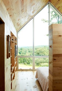 Happy Trails - Photo 1 of 7 - An 800-square-foot addition expands the Virginia home of Lauren and Josh Stegall. Built for $120,000, the structure has a large window overlooking the Blue Ridge Parkway and Sugarloaf Mountain. 