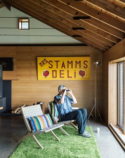 Cottage Industrious - Photo 3 of 10 - At the lake house, the couple host guests, watch through binoculars as birds go by, sketch, grill, and just relax. "We come up here primarily to get away," says Damiani.