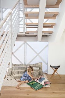 Such Great Heights - Photo 7 of 13 - Siegal chose a diagrid structure for the factory-built steel modules; polycarbonate panels create a luminous space beneath the stairs.