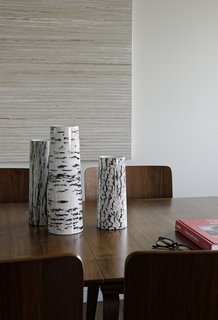 The three stoneware vases featuring an abstracted wood-bark pattern are from the Modern by Dwell Magazine collection.