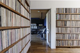Downstairs are more shelves of records, the master and guest suites, and Jack’s music studio. 