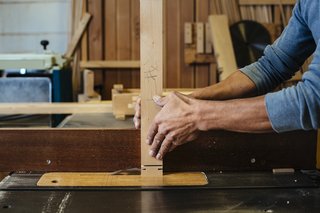 How to Shape a Shoji, Step by Step - Photo 3 of 8 - Making the screen is like putting together a puzzle. Here, an attachment on the table saw is used to cut the grooves that will be needed for the final assembly.