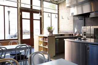 The renovation and design of the space, which had been vacant for decades when Ryan found it, was realized through a team comprised of Santos, local design-build firm Drawing Dept, and contractors Sansalone & Associates. Many local makers were involved in outfitting the interiors, from the custom bent-wood chairs by Brush Factory to the bespoke serving ware created by local artisan Christie Goodfellow of CG Ceramics. 