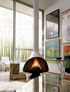 10 Ways to Bring a Little “Hygge” Into Your home - Photo 4 of 10 - The Malm Fireplace via DWR is available in black, white, or stainless-steel.