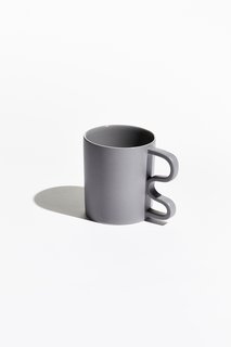 Mean Mug - Photo 2 of 4 - Rather than the conventional half circle, each mug is held by a sharp, squiggly, or abstract handle. 